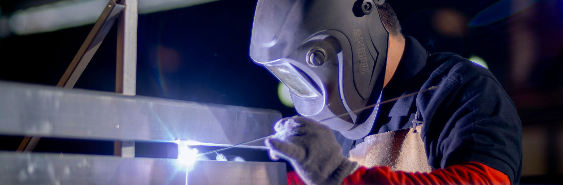 man welding