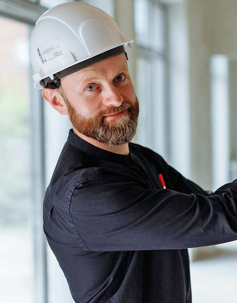 man wearing hard hat man wearing hard hat